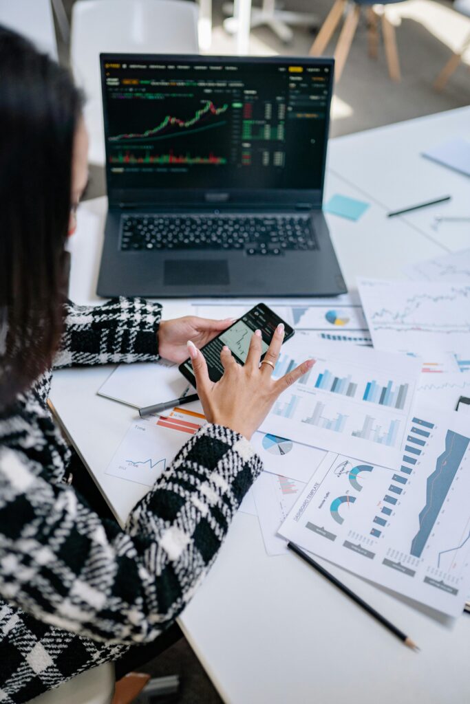 Professional research analyst analyzing financial charts and reports, symbolizing skills beyond the NISM Series XV exam.”